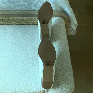 Ivory calf height cowboy boots with  urged tan block heel